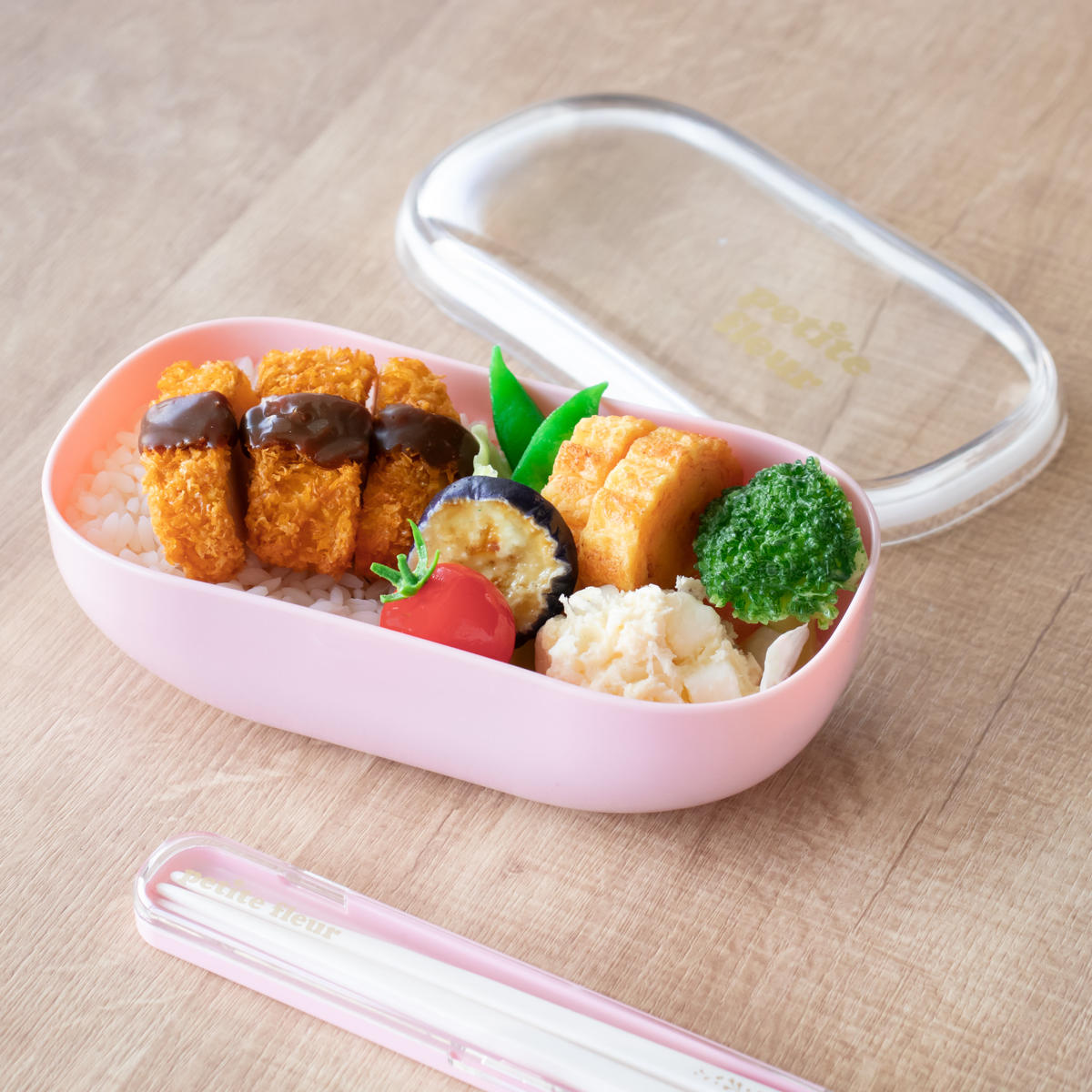弁当箱 600ml プチフルール オーバル 1段 ランチボックス ( お弁当箱 食洗機対応 レンジ対応 ドーム蓋 女子 日本製 食洗機OK レンジOK お弁当 弁当 一段 ランチバンド付き ドーム型 おしゃれ かわいい クリア ) 【ピンク】 ピンク