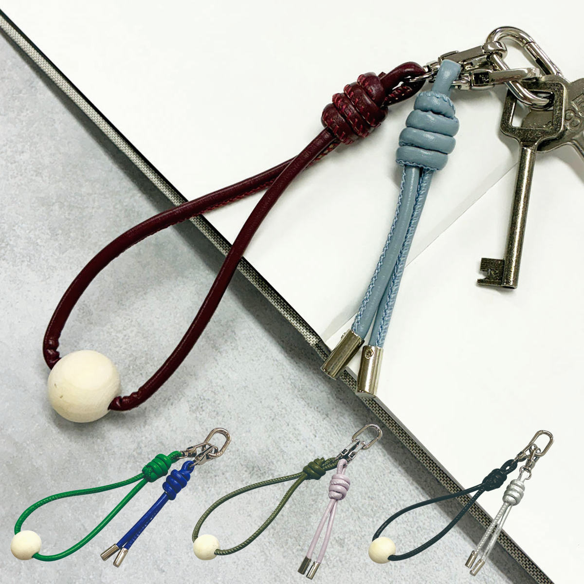 ハンド ストラップ チャーム カメラ スマホ （ スマホストラップ 手首 ブレスレット 紐 手 手元 落下防止 挟むだけ かわいい おしゃれ 旅行 持ち歩き レディース メンズ 紛失防止 ） 【ブラック×シルバー】